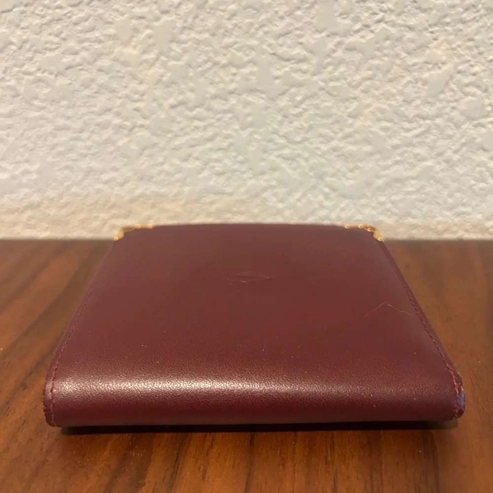 Cartier Burgundy Leather Wallet with Gold Corner Accents